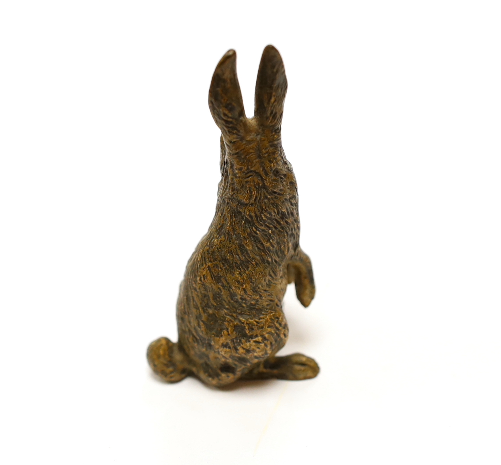 An Austrian cold painted bronze model of a hare, stamped Geschutz, 9cms high